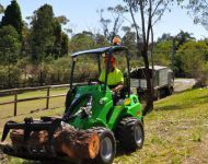 Avant with log attachment