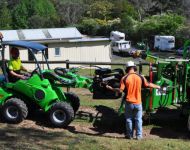 Avant loading wood chipper